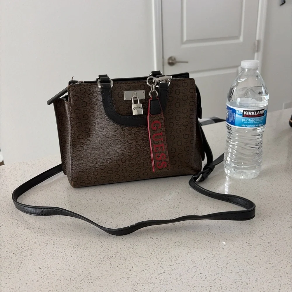 Guess Brown and Black Logo Crossbody Bag with Red Accent